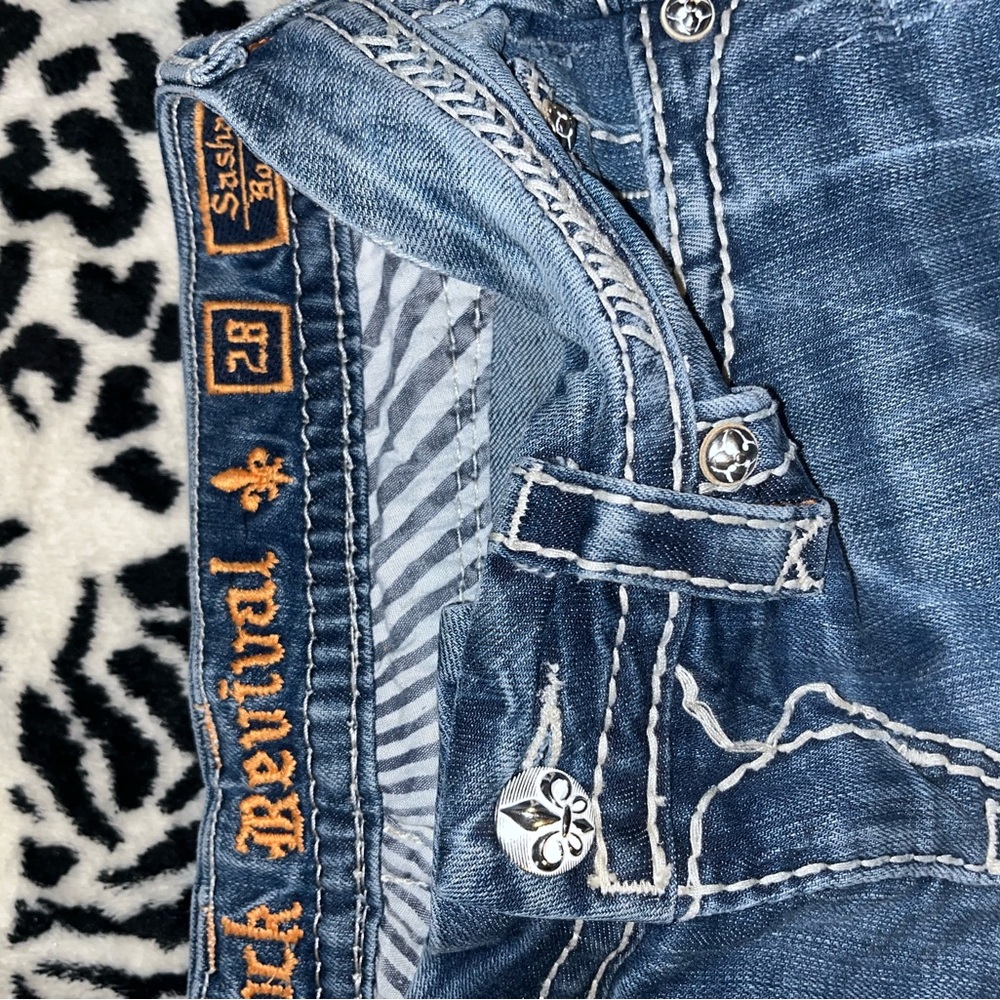 Rock Revival Indigo Jeans with Silver Accents